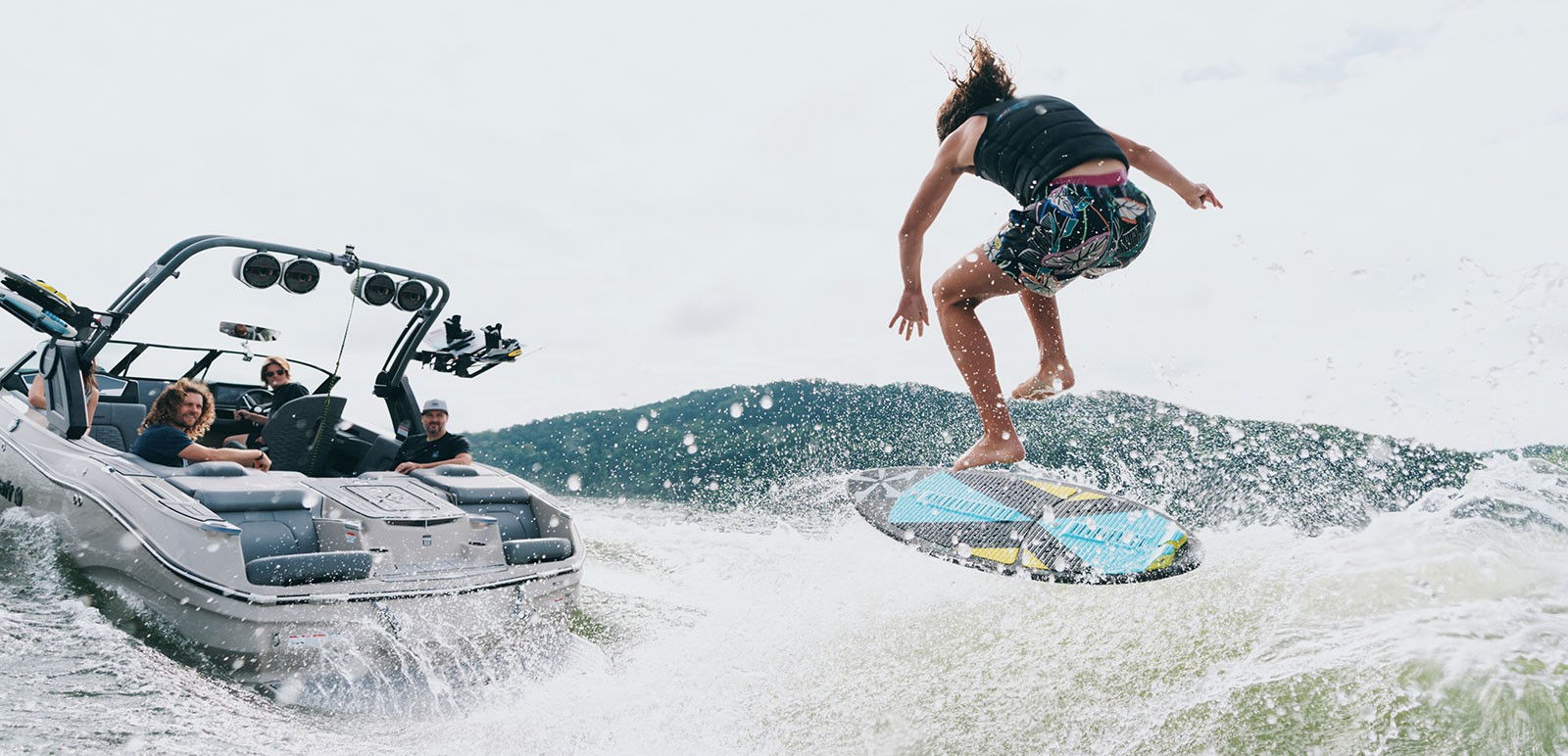 Surfer flipping on a wake