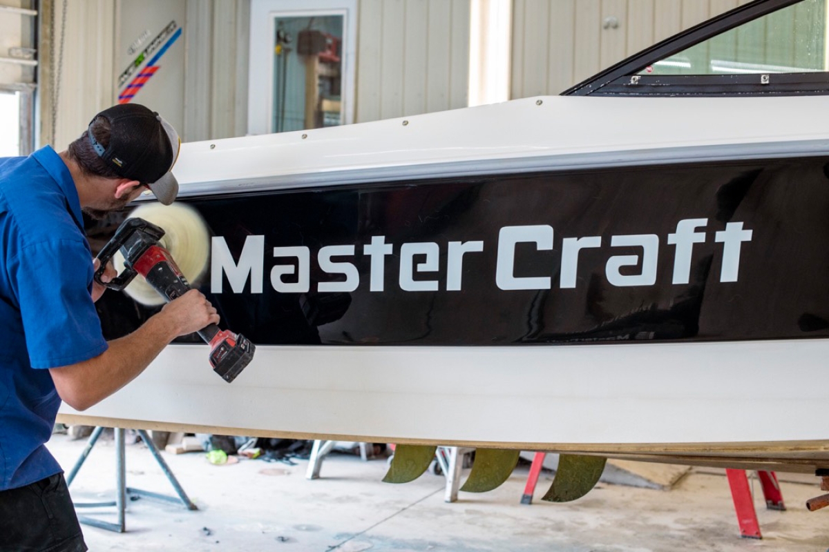 Putting the finishing touches on a boat restoration